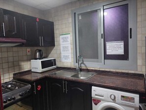 Fridge, microwave, oven, stovetop - Wael Homes Dubai Closed Partition Room (Dubai)