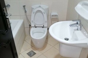 Combined shower/tub, bidet - Wael Homes Dubai Closed Partition Room (Dubai)