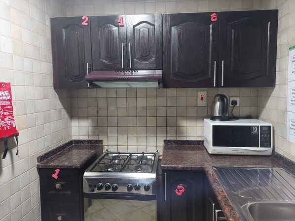 Fridge, microwave, oven, stovetop - Wael Homes Dubai Closed Partition Room (Dubai)