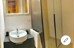 Shower, bidet, towels, soap