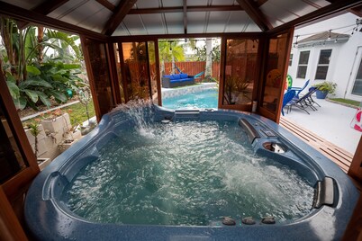 Gorgeous Urban Oasis W/hot Tub, Heated Pool And Private Movie Theater 3 Bedroom Home by RedAwning