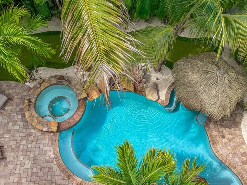 Near the Beach with Balconies and Tiki Bar