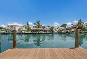 Waterfront property with a dock and modern buildings.