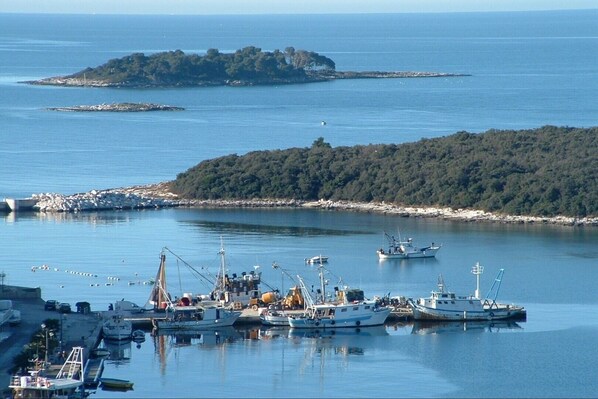 Enjoy waterfront views and serene surroundings near a bustling marina.