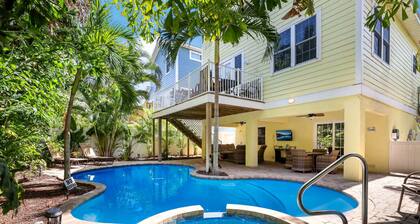 Beautiful home with fenced yard, heated pool, hot tub, and elevator!