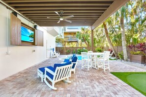 Outdoor dining - Adorable Cottage with Covered Balconies and Private Pool (Anna Maria)