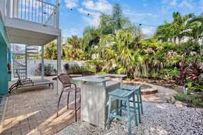 Outdoor dining - Holmes Beach Vacation Home with Pool, Ping Pong, and Tiki Bar! 6 minutes to Beac (Holmes Beach)