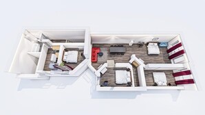 A modern hotel room layout with a kitchen, a living area, and two bedrooms.