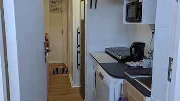 Apartment | Private kitchen | Fridge, microwave, stovetop, dishwasher