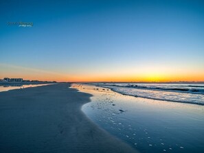Enjoy a serene beach experience with a wide, public space perfect for relaxation and leisure activities.