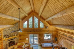 TV, fireplace - Deer Haven Lodge – Spacious Family Cabin with Hot Tub, Game Room & Scenic Views (Lead)