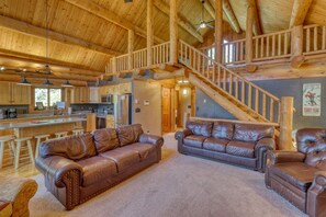 TV, fireplace - Deer Haven Lodge – Spacious Family Cabin with Hot Tub, Game Room & Scenic Views (Lead)