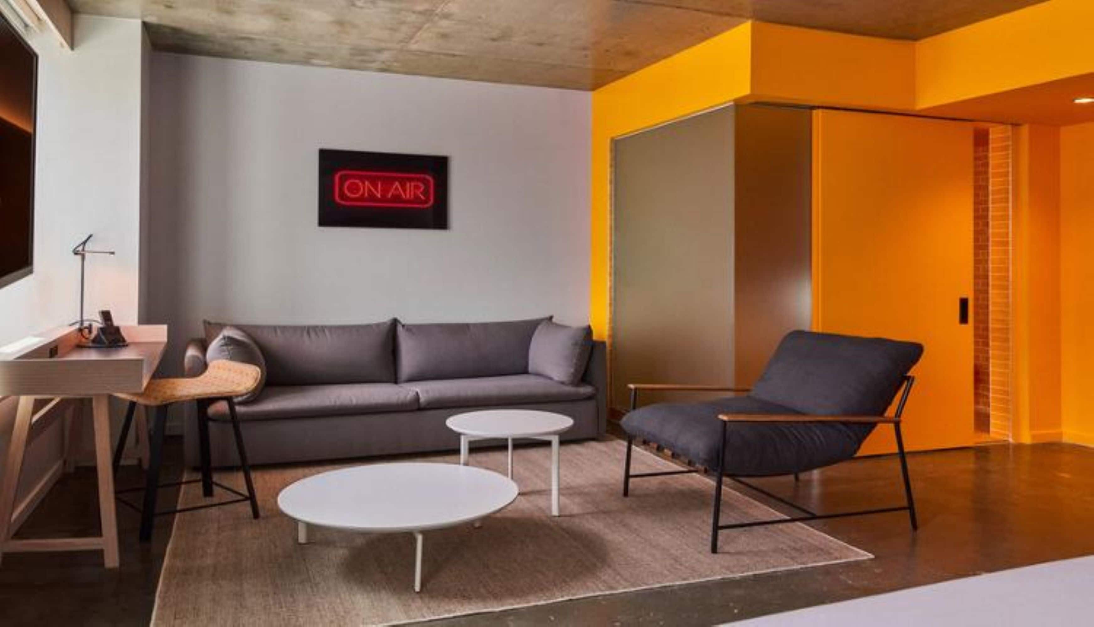 Premium bedding, in-room safe, laptop workspace, soundproofing