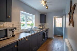 Cottage, salle de bains privée | Cuisine partagée