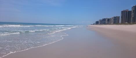 On the beach, sun-loungers, beach towels