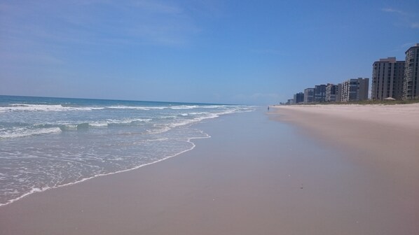 On the beach, sun loungers, beach towels