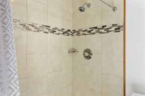 Combined shower/tub, hair dryer, towels, soap