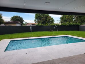 Outdoor pool, a heated pool - Beautiful 5 bedroom Modern Home with a Pool (Miami Gardens)