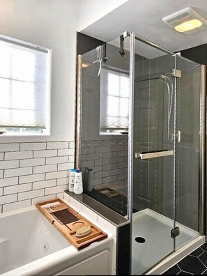 Bathtub, jetted tub, towels, soap