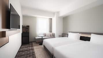 Down comforters, pillowtop beds, in-room safe, desk