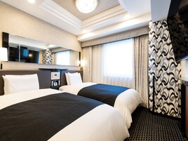 Deluxe Twin Room, Non Smoking | Down comforters, desk, blackout drapes, free WiFi