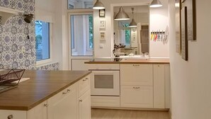 Oven, stovetop, dishwasher, cookware/dishes/utensils - Newly Refurbished Apartment in the City Center (Sofia)