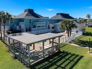 Enjoy a relaxing stay in this two-story residence with a spacious balcony and outdoor seating area.
