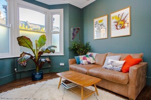 Basic House, Multiple Beds | Living room | TV