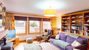 Smart TV, fireplace, DVD player, books