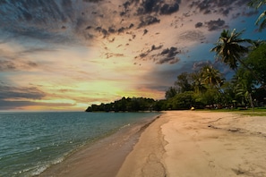 Private beach, beach towels, beach volleyball, beach bar