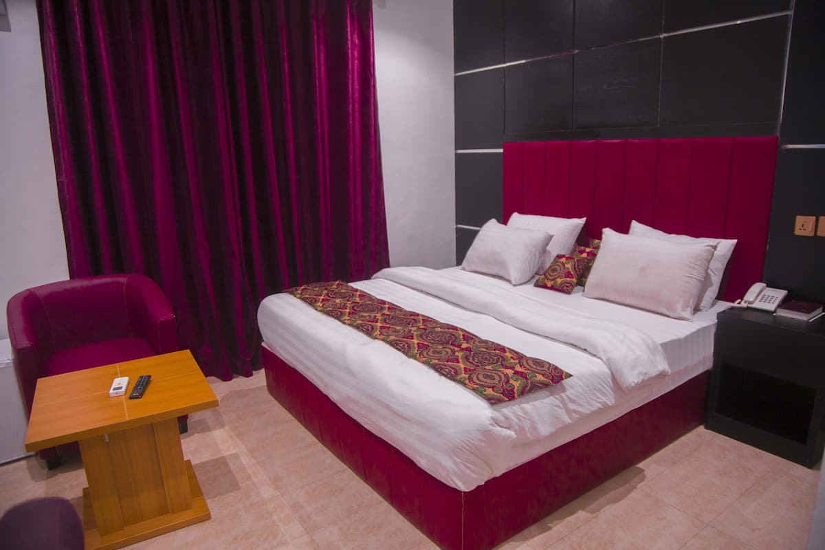 Premium bedding, pillow-top beds, desk, laptop workspace