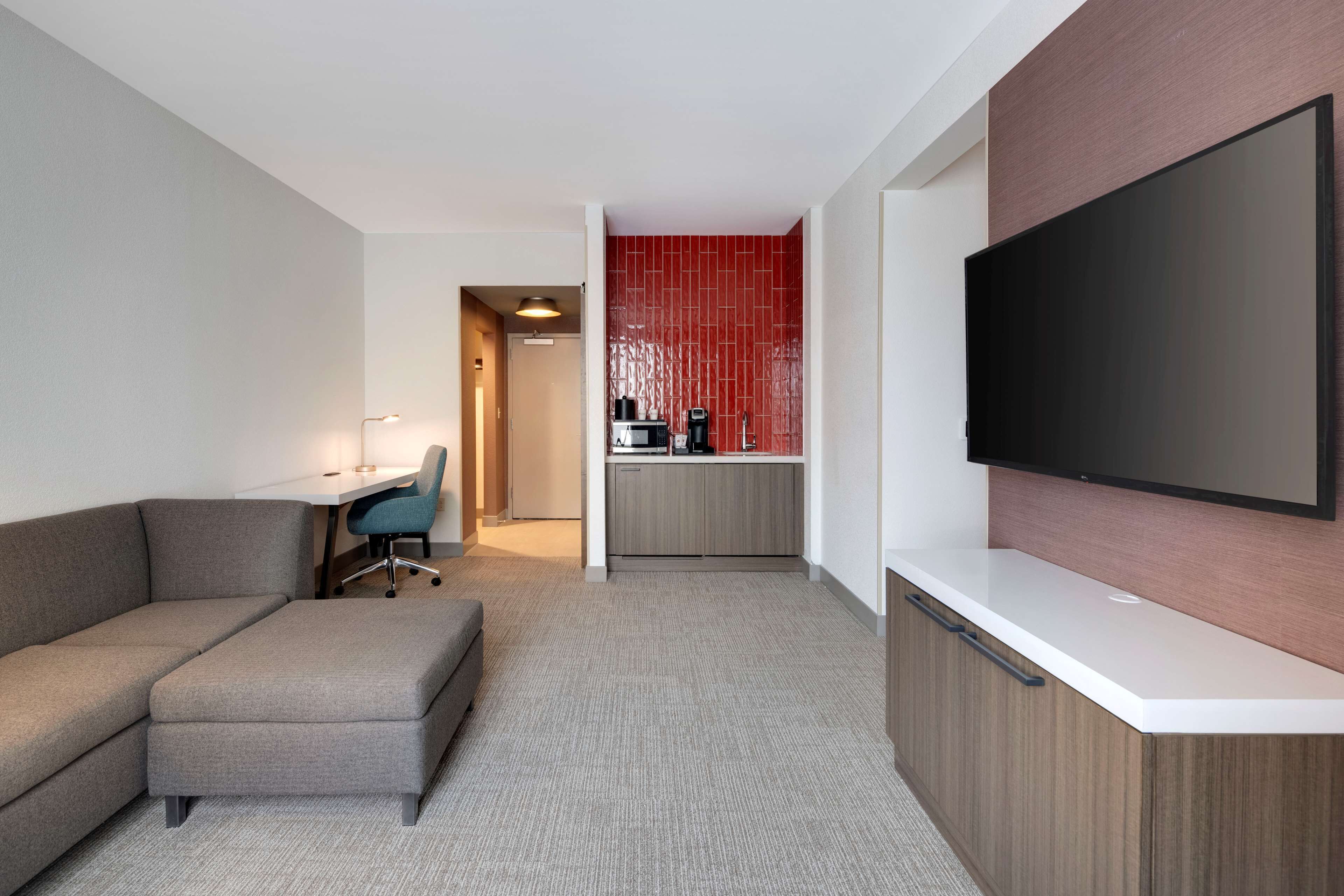 desk, laptop workspace, blackout curtains, iron/ironing board