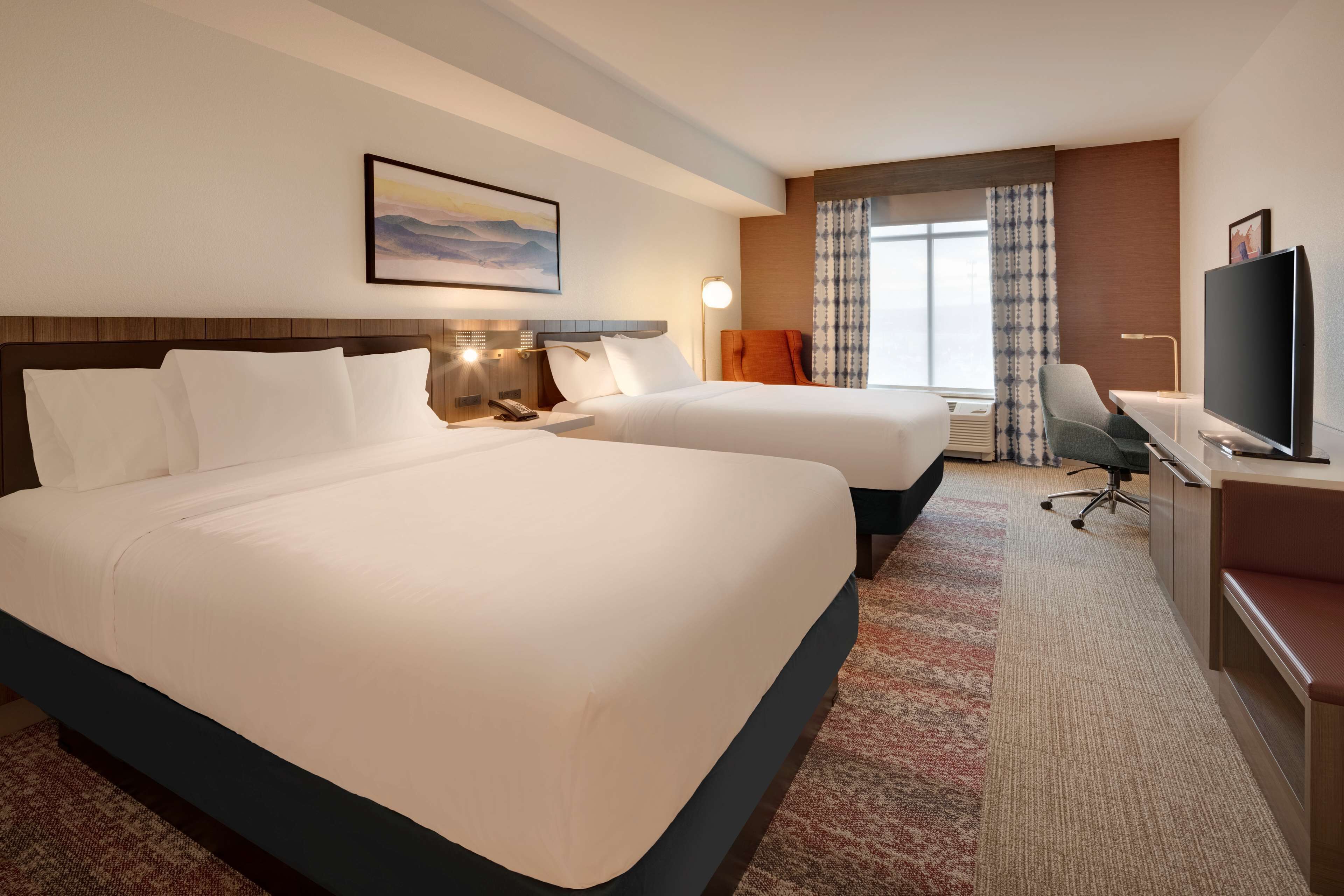 desk, laptop workspace, blackout curtains, iron/ironing board