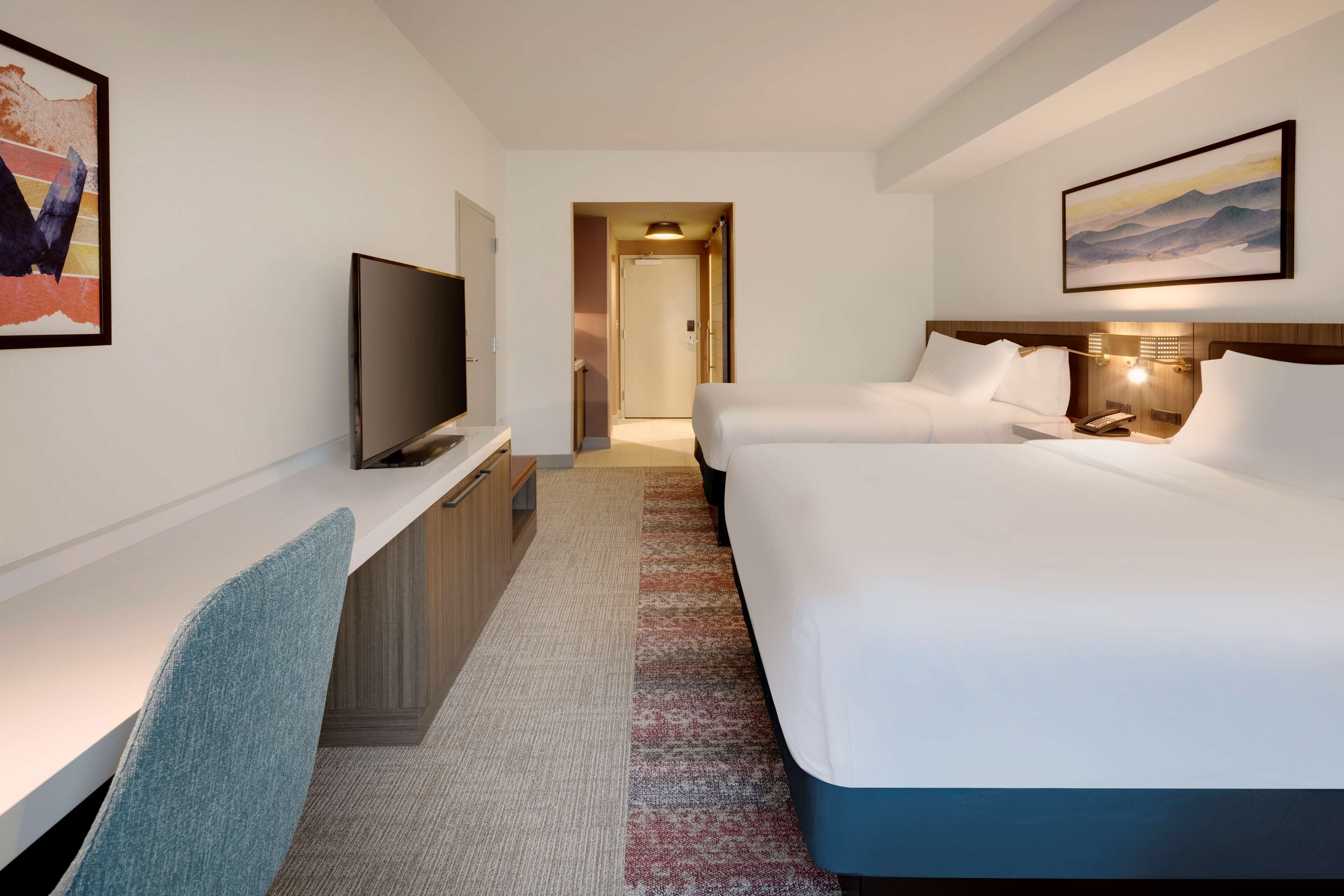 desk, laptop workspace, blackout curtains, iron/ironing board