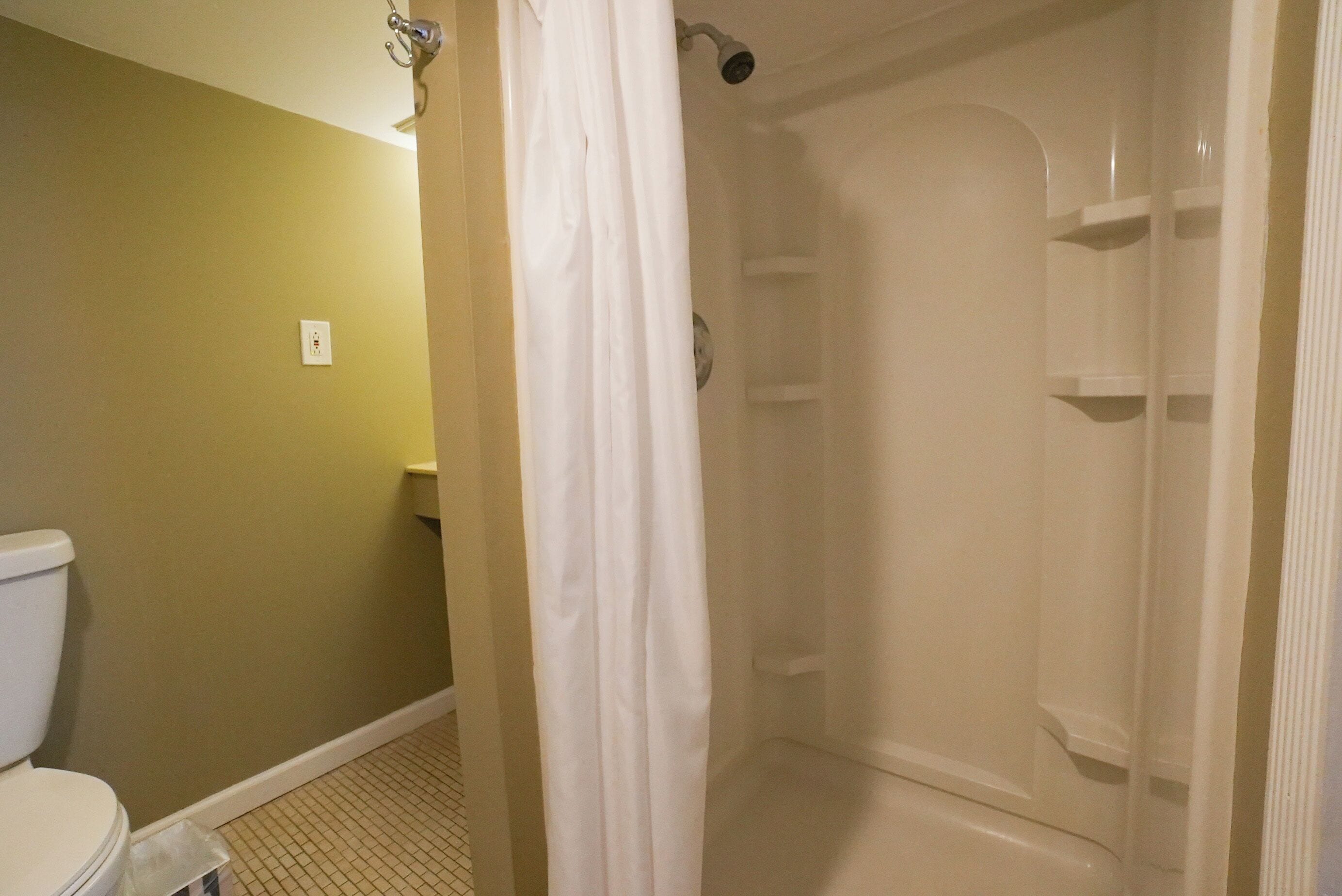 basic studio | bathroom | shower, hair dryer, towels