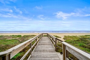 Walk along the boardwalk to the ocean and sandy shore.
