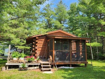 The Copper Squirrel is a secluded full log cabin on 10 acres.