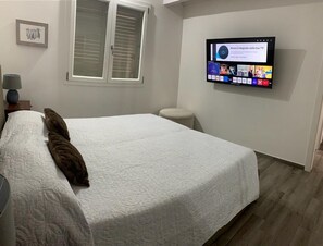 2 habitaciones, tabla de planchar con plancha y wifi gratis 