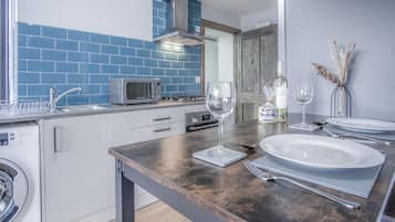Căn hộ (1 Bedroom) | Khu phòng khách | TV màn hình phẳng 32-inch có truyền hình cáp, TV