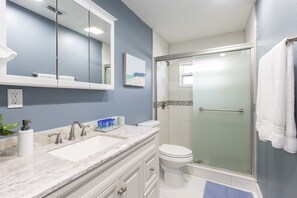 Shower, hair dryer, towels, soap