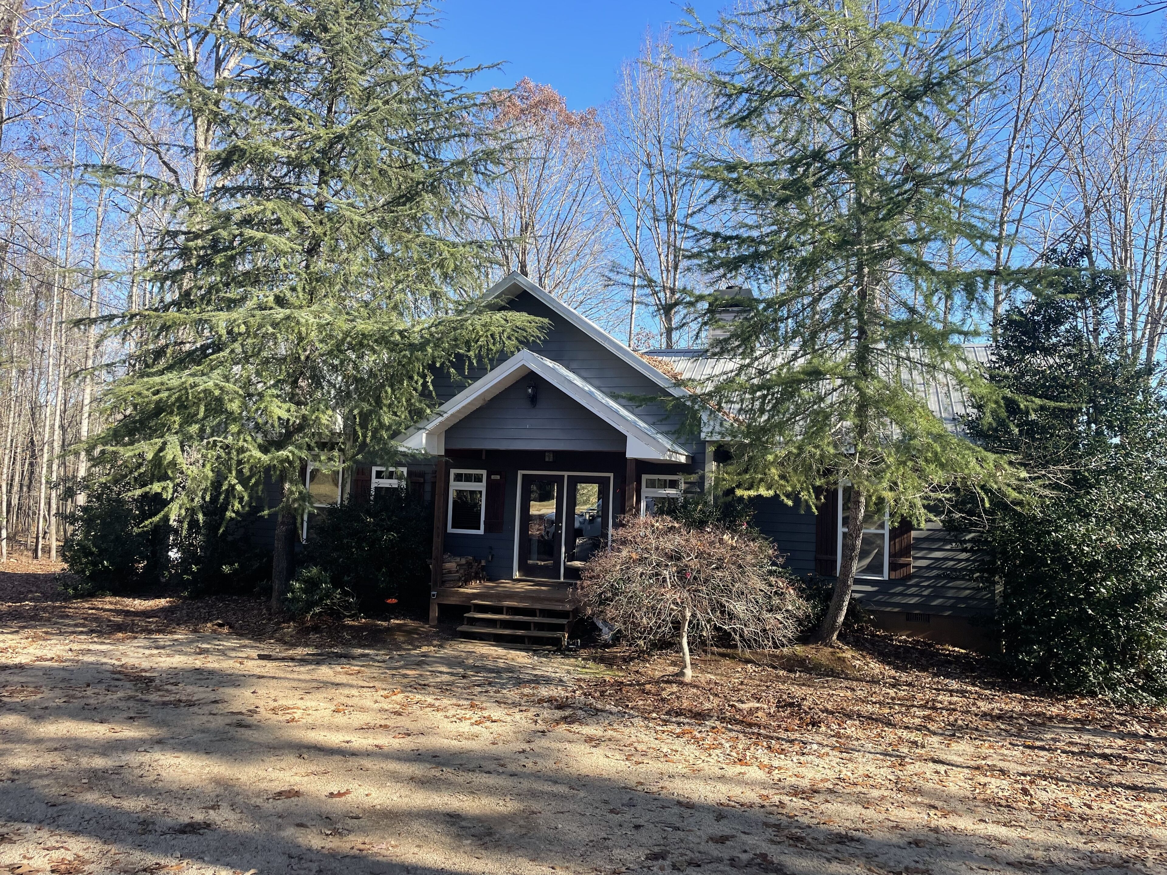 Secluded & Private Cabin situated over stocked pond.