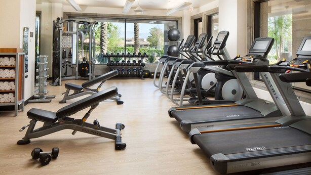 A gym with treadmills, dumbbells, and weight machines. - The Westin Mission Hills Resort Villas, Palm Springs (Rancho Mirage)
