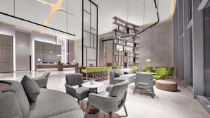 A modern lobby with grey sofas, round tables, and green chairs. There is a reception desk with a computer and a plant. - Holiday Inn Hotel & Sts Wuhan International Expo (Wuhan)
