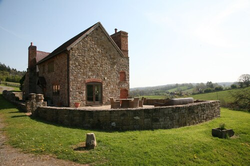 Self-catering farmhouse set in 68 acres of private land - dog and child friendly