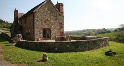 Self-catering farmhouse set in 68 acres of private land - dog and child friendly