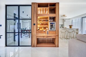 Exclusive Villa, 4 Bedrooms | Living area | 49-inch Smart TV with satellite channels, TV, fireplace