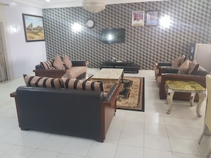 Presidential Twin Room, 1 Bedroom, Pool View | Living area
