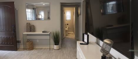 Combined shower/tub, hair dryer, towels, toilet paper