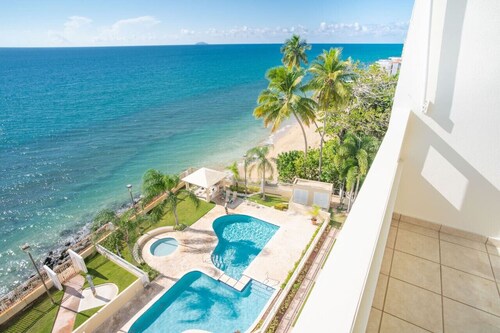 Pelican Reef 703 Beachfront Penthouse with Ocean and Sunset Views
