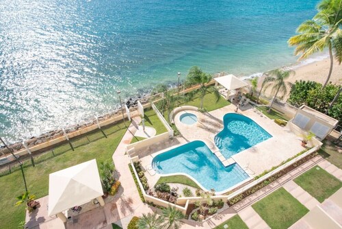 Pelican Reef 703 Beachfront Penthouse with Ocean and Sunset Views